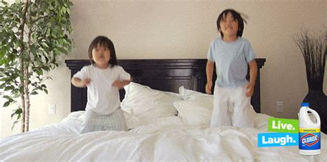 jumping on bed by clorox find and share on giphy