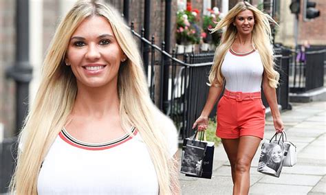 christine mcguinness puts on a leggy display in orange shorts in liverpool