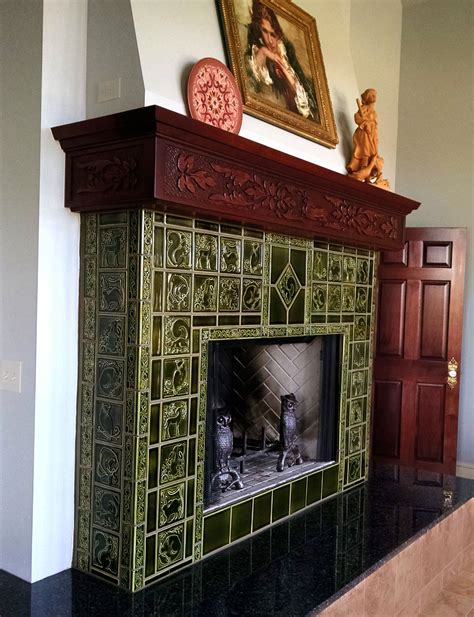 fireplace tiles  carreaux du nord studio  olive green glaze art tiles  acorn border