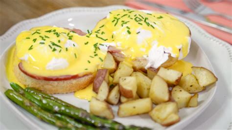 eggs benedict with breakfast potatoes and roasted asparagus mother s