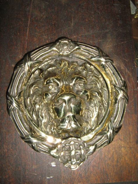 large lions head wreath door knocker