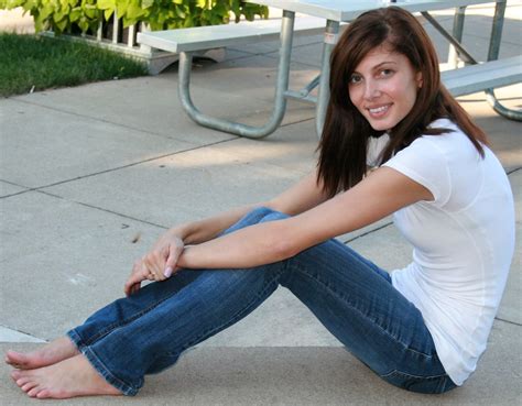 Blue Skinny Jeans Barefoot White Top Smiling 7 10