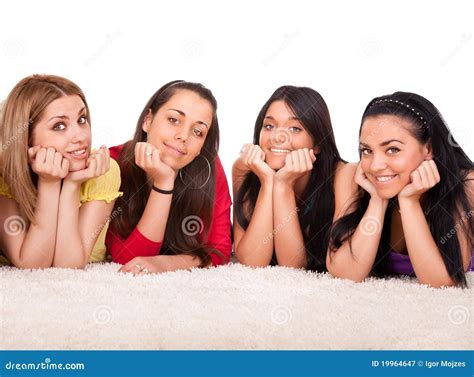 Four Beautiful Girls On The Floor Stock Image 19964647