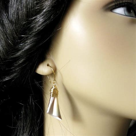 gold wire wrapped earrings spiral seashell earrings shell etsy