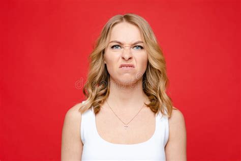 Portrait Of Young Beautiful Caucasian Woman With Medium Blonde Wavy