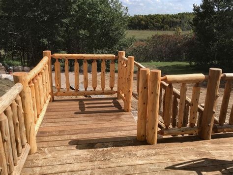 soderlunds wood mill cedar log railing custom built   home cabin deck  business