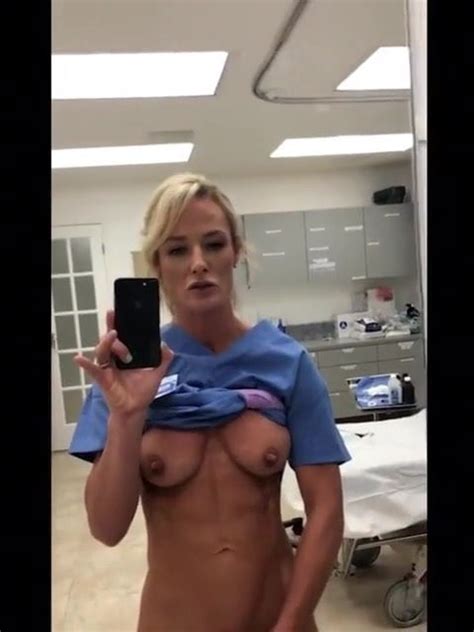 real whore nurse at work stripping and slapping her ass