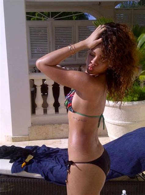 Rihanna Flaunts Bikini Body In Barbados [photos]