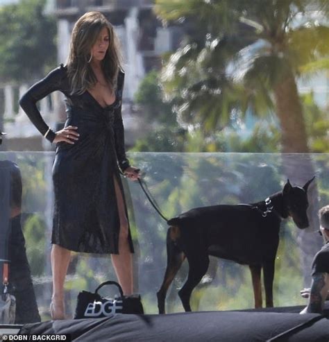 jennifer aniston 50 goes braless in black latex dress for sultry malibu photo shoot daily