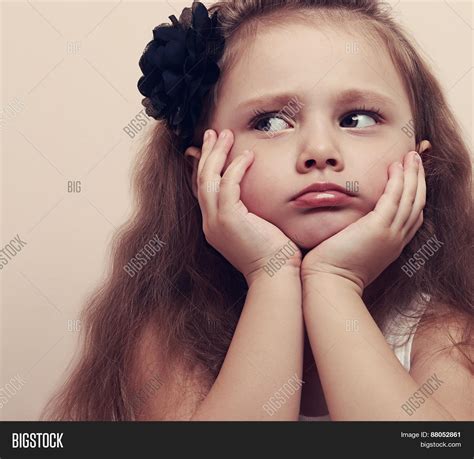 Cute Girl Looking Sad Image And Photo Free Trial Bigstock