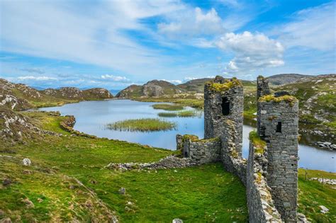 irish cliffside castle perched  feet   atlantic ocean