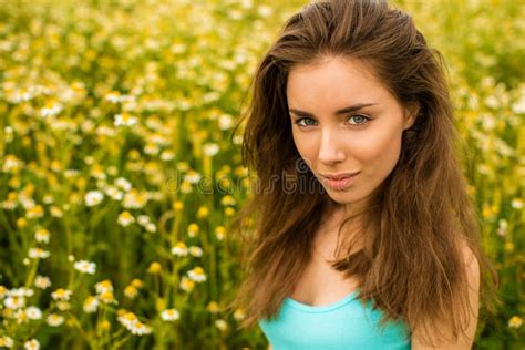 Photo Of Pretty Brunette Woman In Chamomile Field Stock Image Image