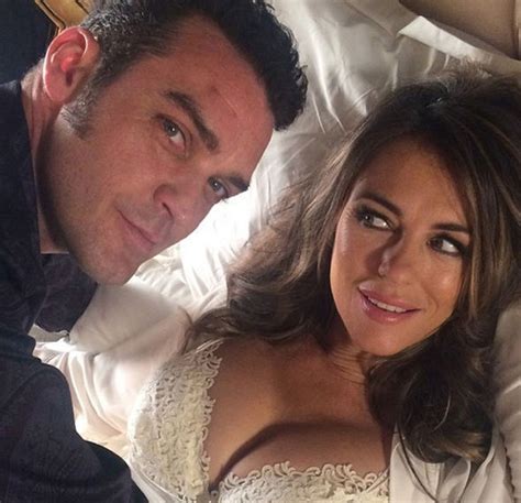elizabeth hurley flaunts extreme cleavage in boob baring