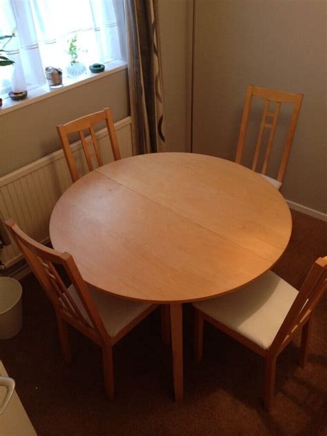 ikea  extending dining table   chairs  stevenage