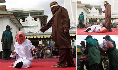 indonesian woman is caned under sharia law daily mail online