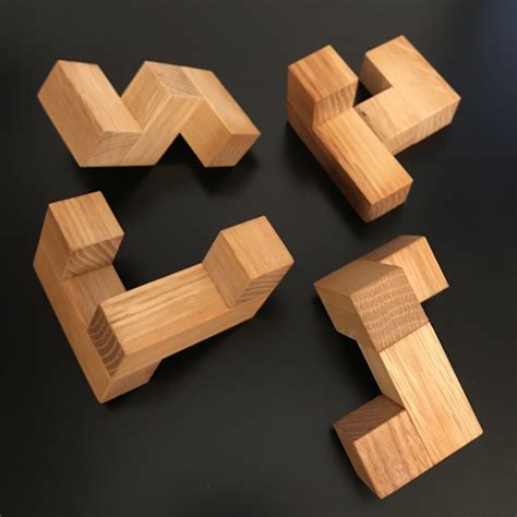 stewart coffins puzzle design    piece interlocking cube