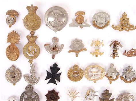 good collection  approx  assorted british army military uniform cap badges  eras