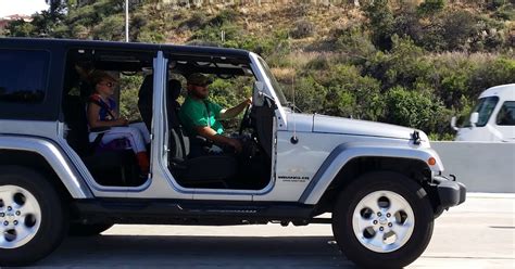car guy rare    jeep   doors  heading   freeway