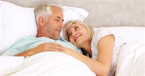 lesbian couple cuddling in bed at home in the bedroom stock footage video 11070161 shutterstock