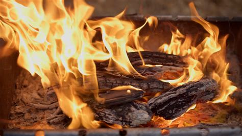 closeup  flames  fire burning wood  stock footage sbv