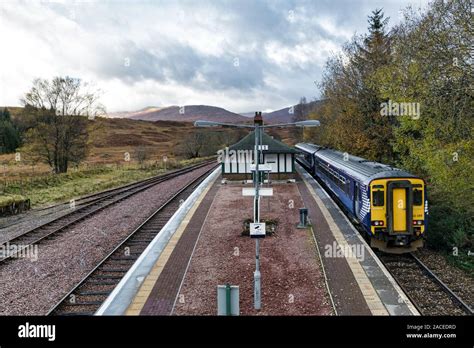 rannoch scotland nov    diesel train coming  platfrom    remote trainstation