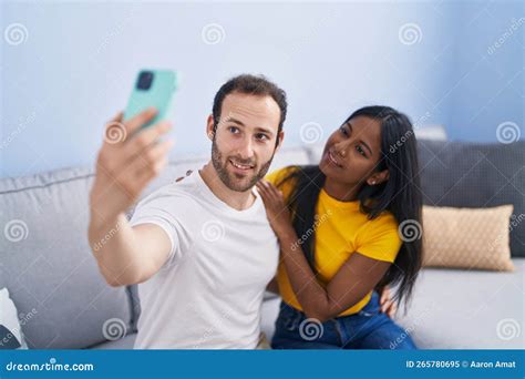 Man And Woman Interracial Couple Making Selfie By Smartphone At Home