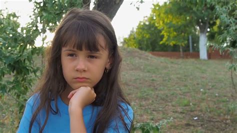 sad concerned teenage girl waiting for cell phone call outdoor stock footage video 17179189