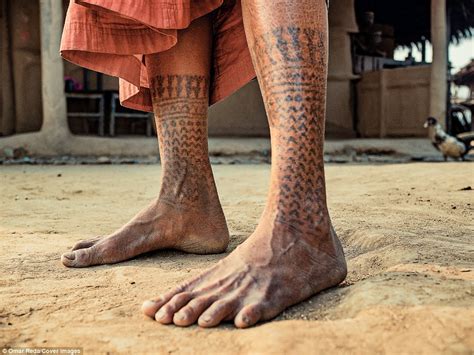 tharu women tattooed themselves to avoid sex slave life