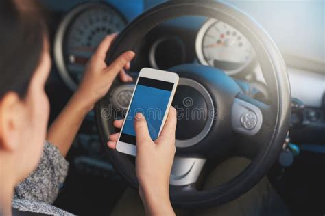 shes putting  life  risk  woman   phone  driving stock photo image