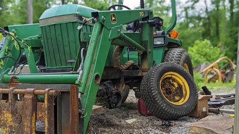 repairing john deere  compact tractor leaking wheel seal   youtube