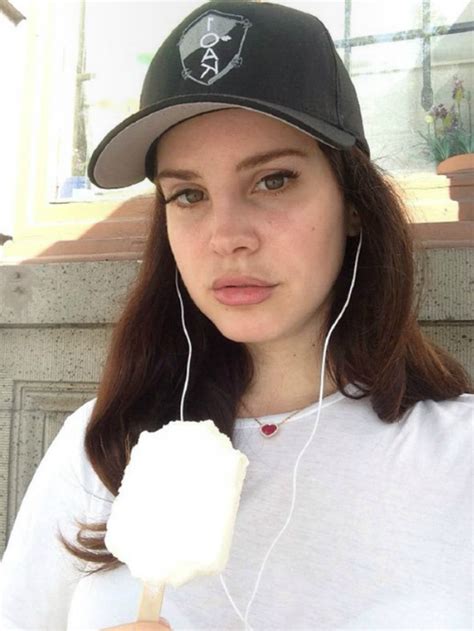 Lana Del Rey Selfie Eating A Popsicle Wearing A Baseball