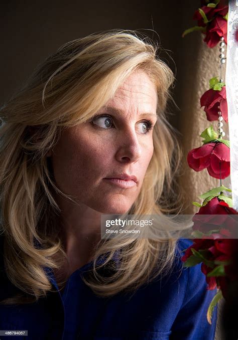 Author Allison Moore Poses During A Portrait Shoot In Albuquerque