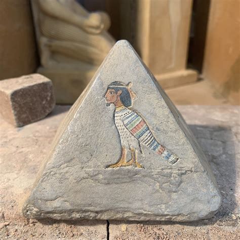 egyptian pyramid sculpture art featuring bast khonsu anubis and the