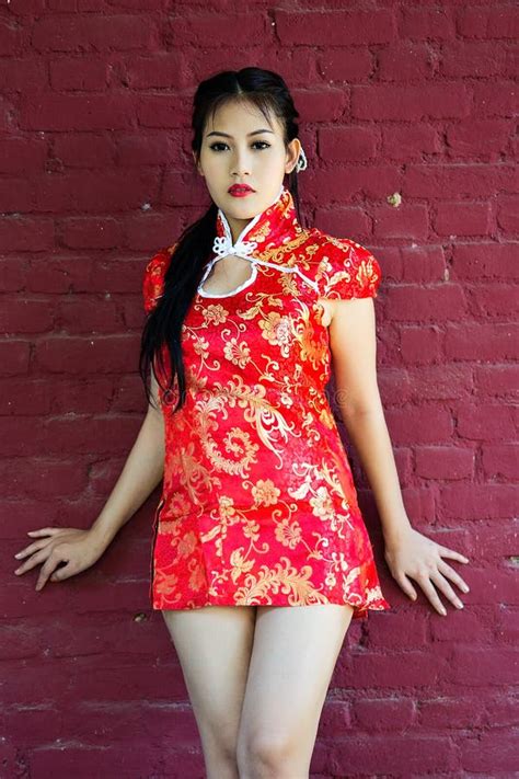 Chinese Girl In Traditional Chinese Cheongsam Blessing Stock Image