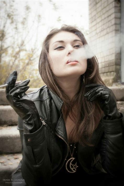 women wearing leather gloves  smoking cigars  london