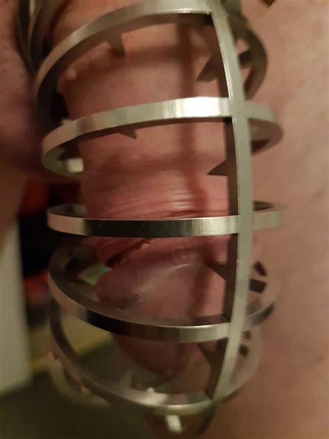 Locked Spiked Chastity Cage Biting My Little Cock 4 Pics Xhamster