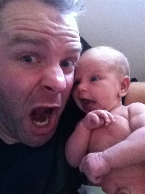 dad taking selfies with his newborn 5 pics