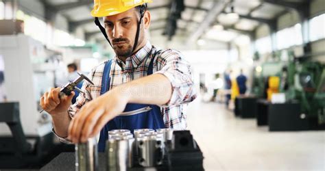 male worker and quality control inspection in factory stock image