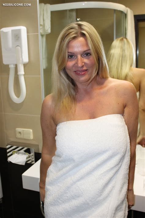 blonde wife shows big naturals in the bathroom