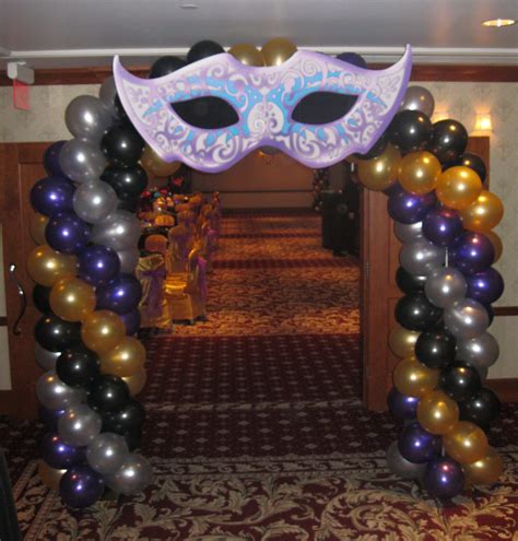 walk through entrance mask balloon arch created by total