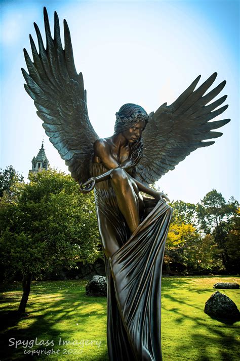 beautiful angel statue   entrance   cemetery  boston ma pics