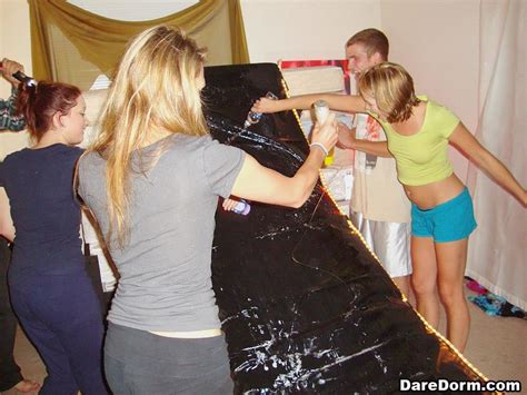 hot college girls have some fun at a dorm party
