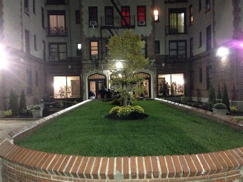 swedish investment firm beautifies crown heights building courtyard ignores leaking ceilings
