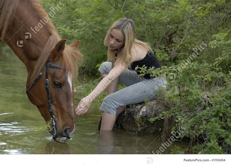 riding girl in river image