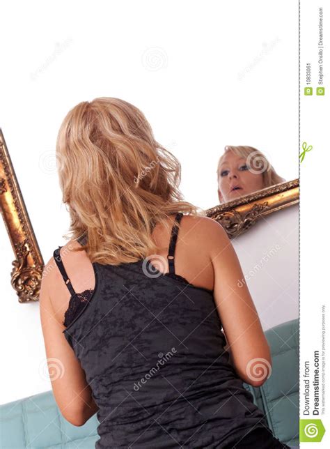 Woman Looking In Mirror Stock Image Image 10833061
