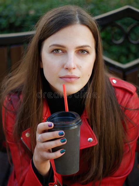 Outdoor Close Up Shot Of 20s Year Stylish Brunette Woman In Red Leather