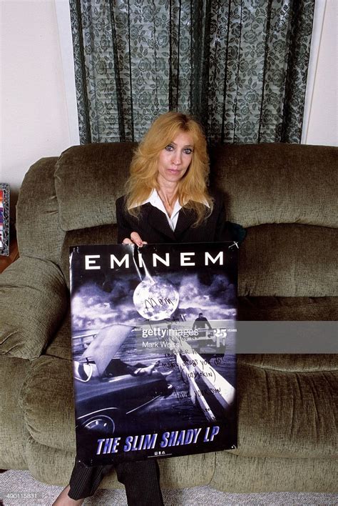 eminems mother debbie mathers holds  poster   hand written message   portrait