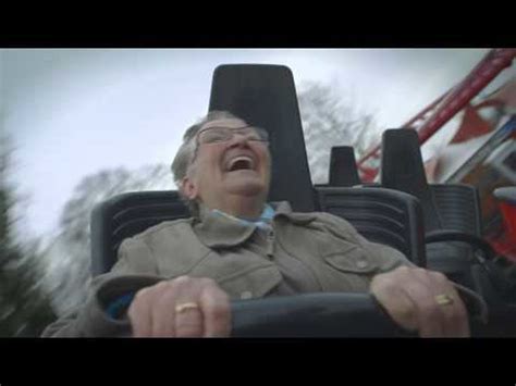 An Old Woman Rides A Roller Coaster For The First Time