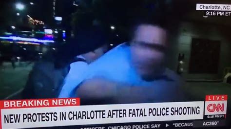 video cnn reporter decked by protestor on live tv the spun what s