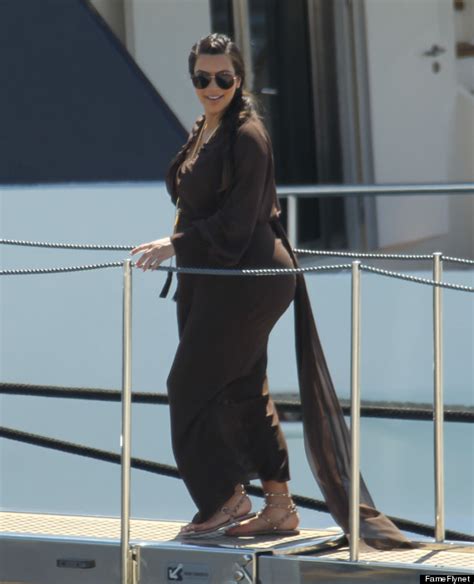 Kim Kardashian Flashes Pregnancy Curves In Clingy Maxi Dress Photo